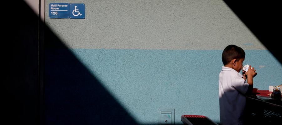 Photo of child at school with info about Prop 51 Prop 51, league of women voters, california, new york times, school bonds, unbiased
